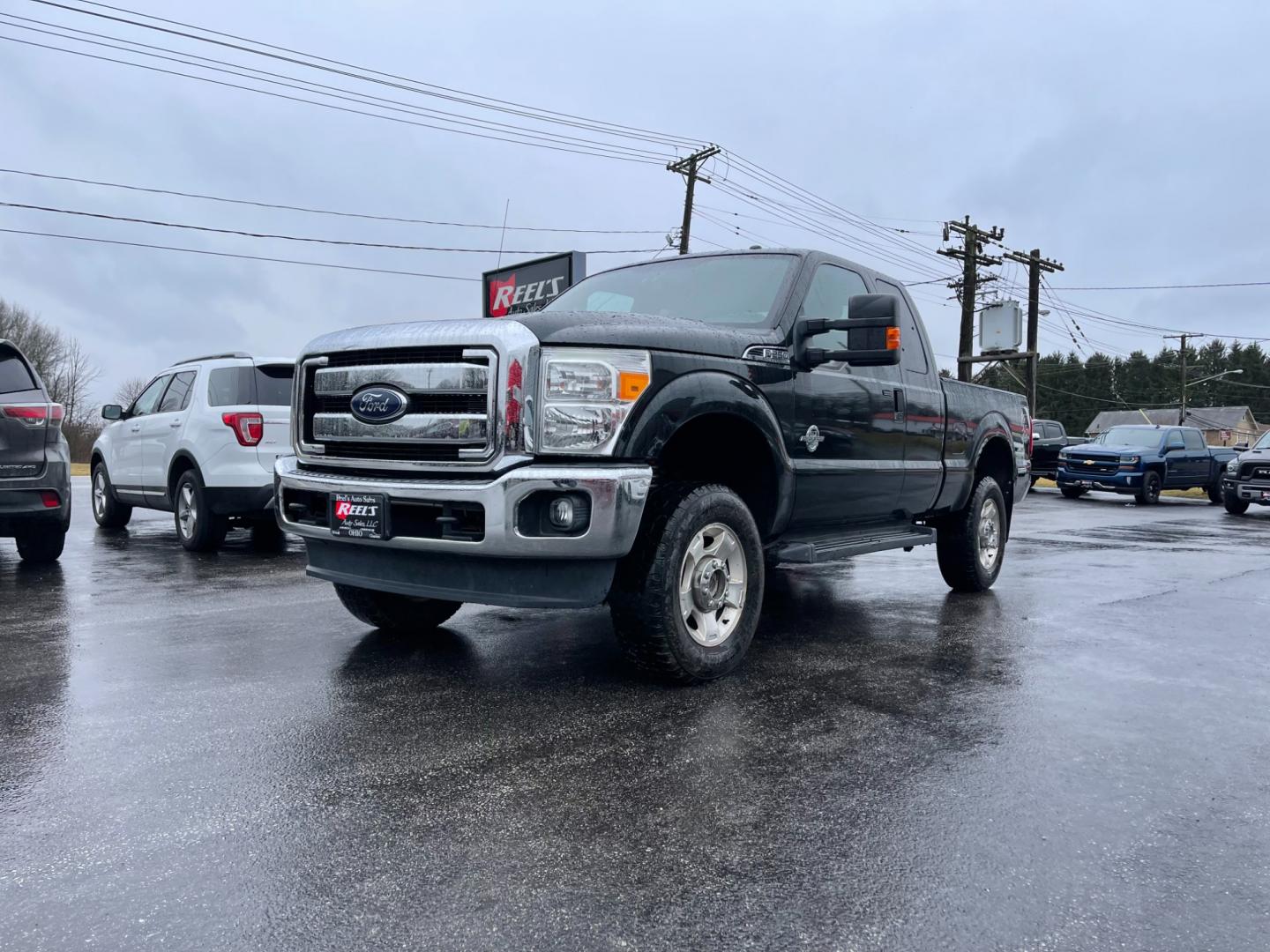 2015 Green /Gray Ford F-250 SD XLT SuperCab Long Bed 4WD (1FT7X2BT6FE) with an 6.7L V8 OHV 16V DIESEL engine, 6-Speed Automatic transmission, located at 547 E. Main St., Orwell, OH, 44076, (440) 437-5893, 41.535435, -80.847855 - Photo#0